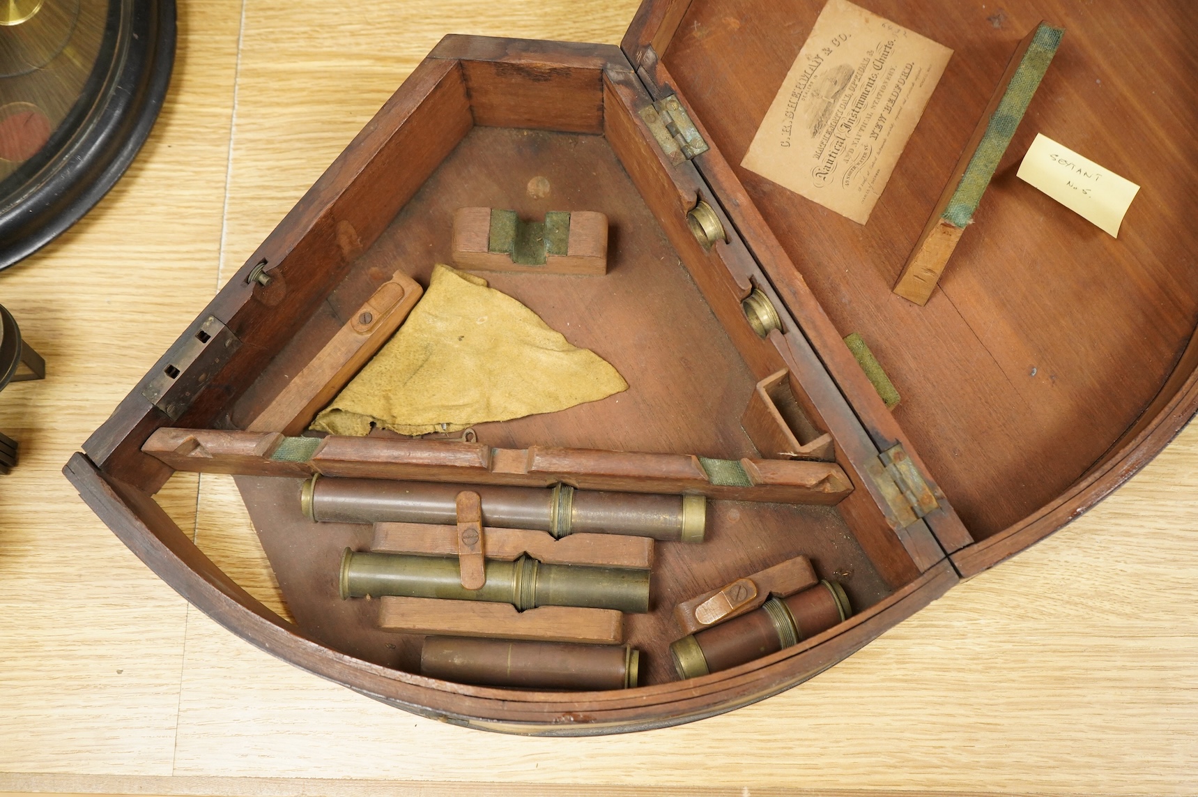 A mid 19th century brass and lacquered double frame sextant, by Troughton & Sims, London, number 2367, the mahogany case containing four interchangeable sighting telescopes, two eyepieces and an adjusting key